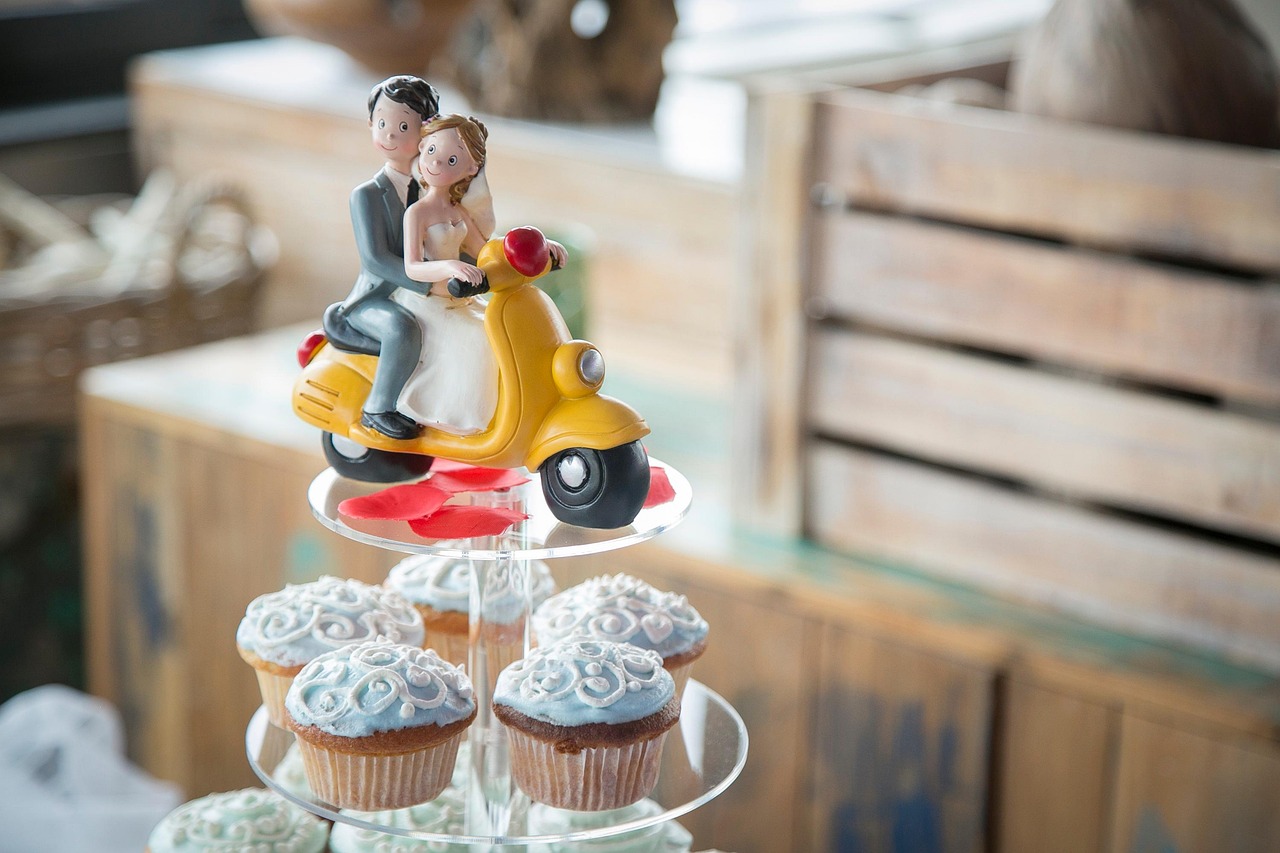 A tower of decorated baby shower cupcakes